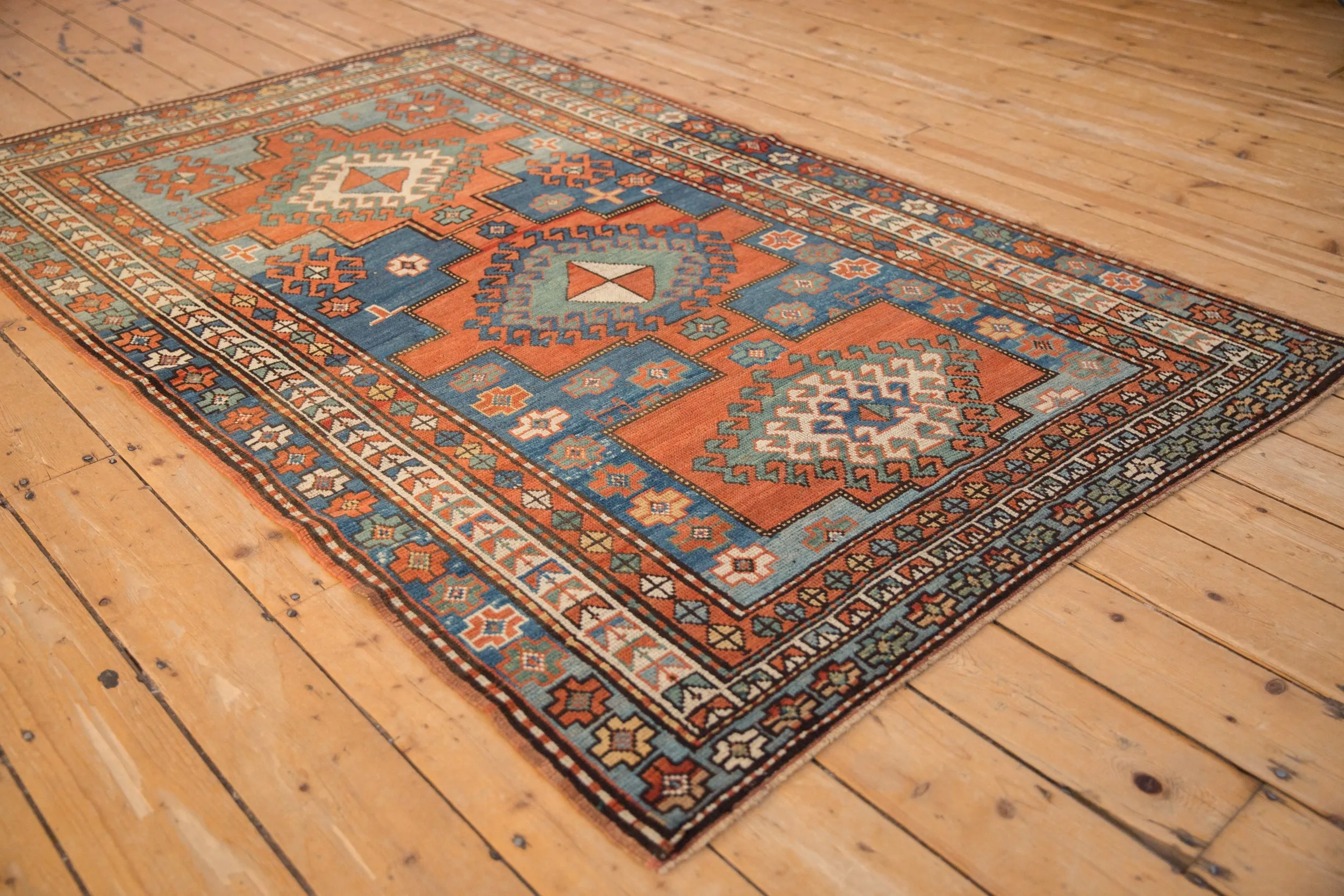 4.5x7 Antique Kazak Rug