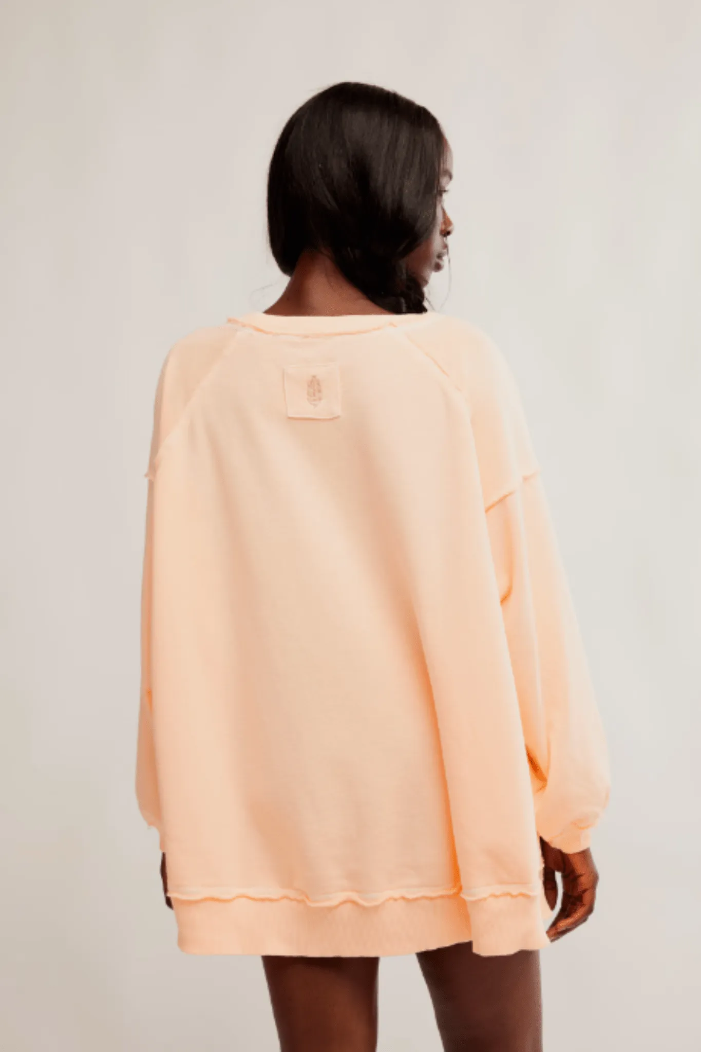 Free People: One To Beat Pullover in Pastel Peach