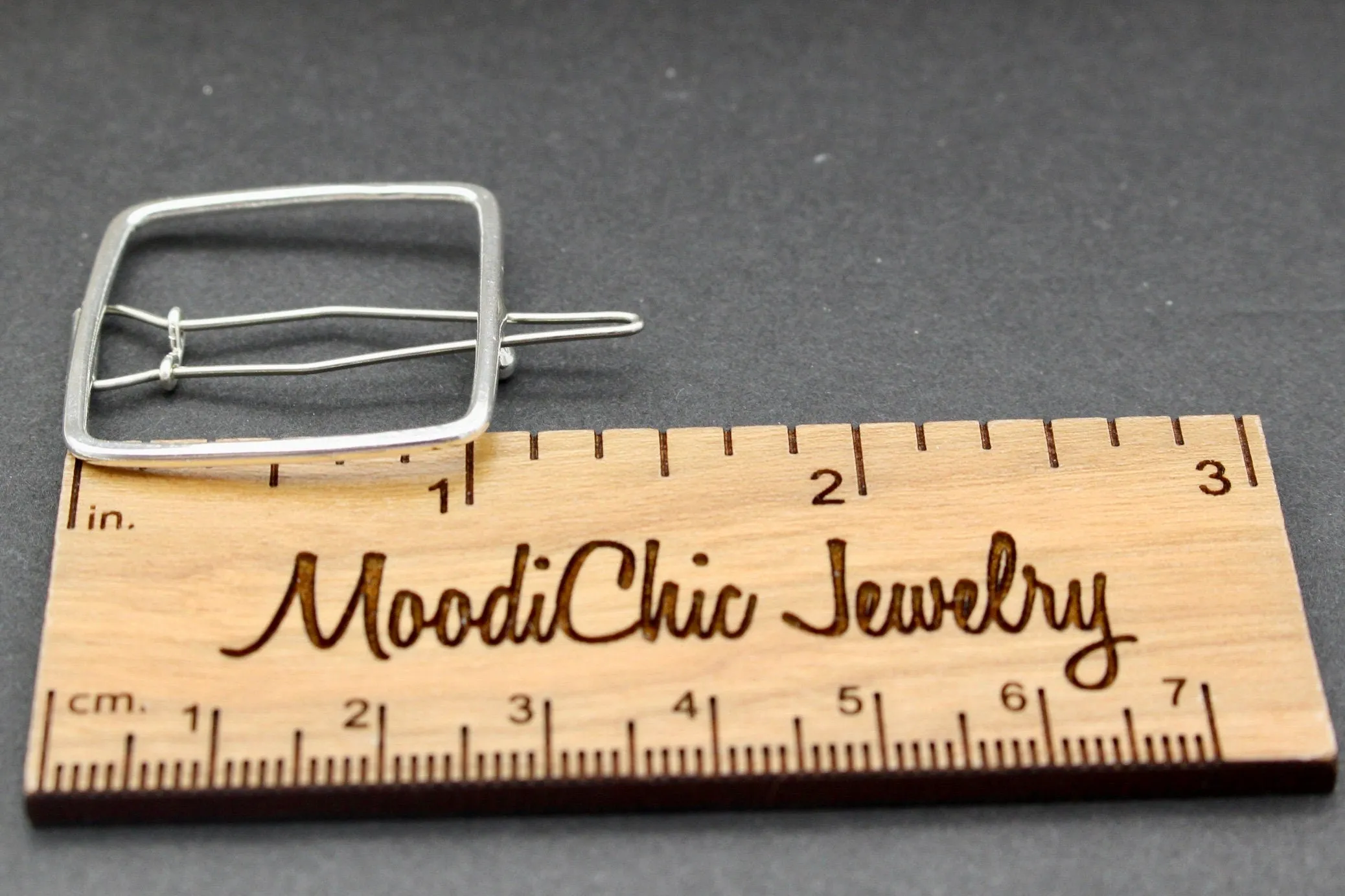 Small square silver barrette