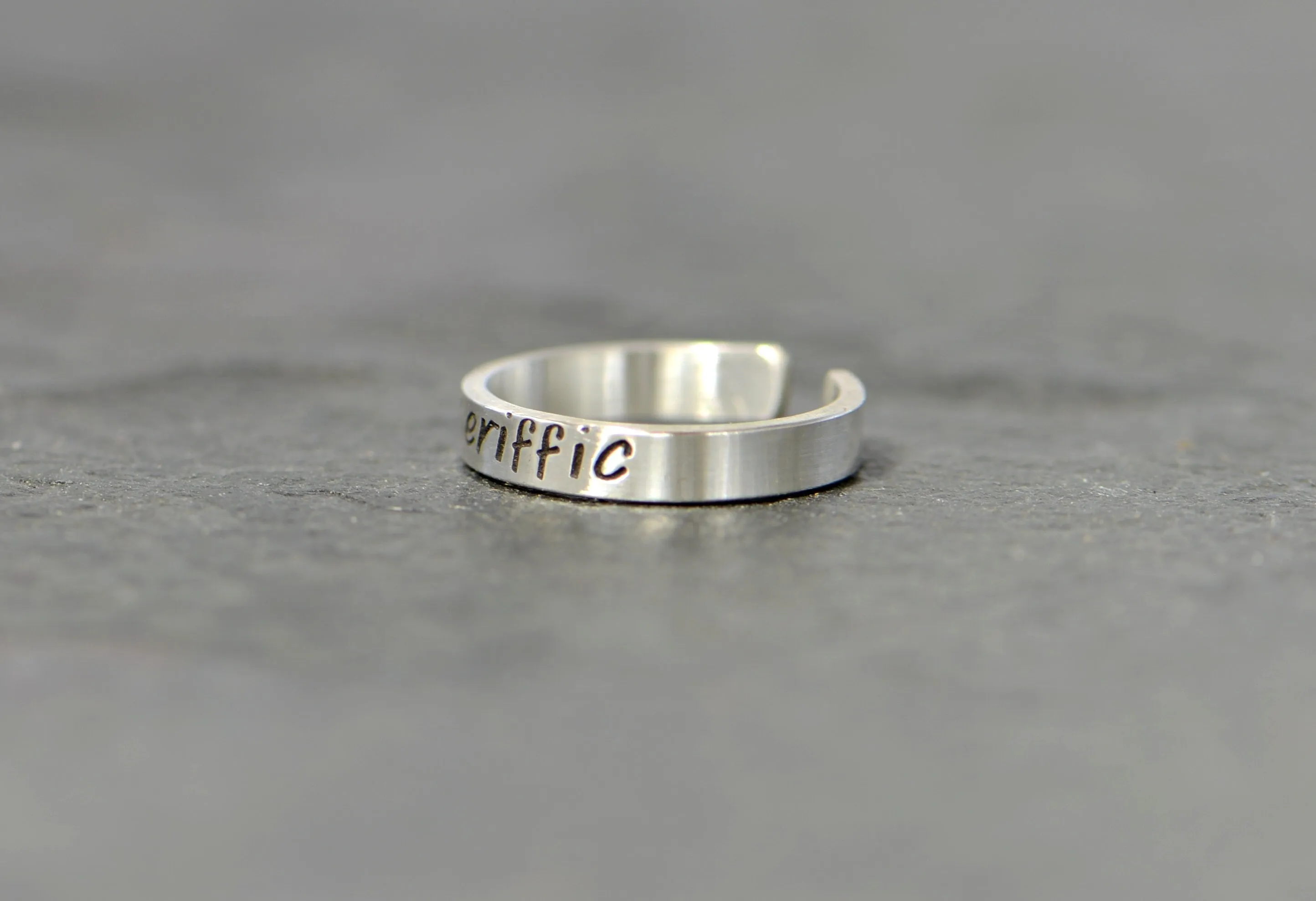 Sterling silver toe ring with "toeriffic"