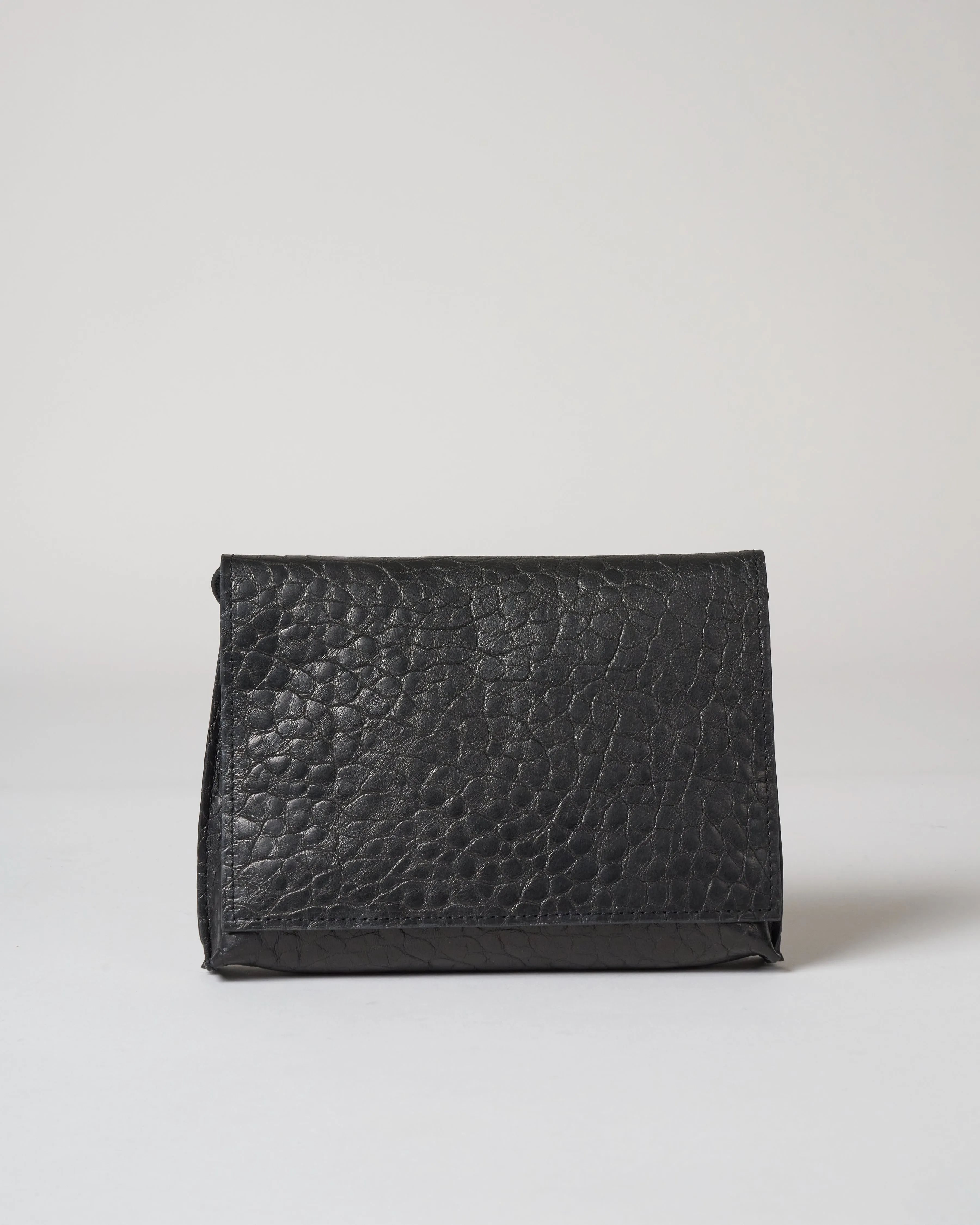 strappy foldover - licorice pebble